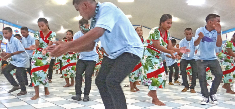 Marshalls Christian High School student Balaan Langidrik leads the spirited jepta from Rongrong Island during a performance at Uliga Protestant Church Christmas night. Photo: Hilary Hosia. High spirit, fewer jeptas