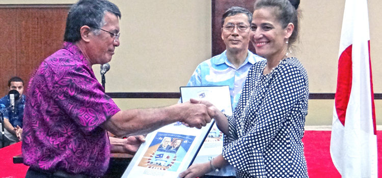 Above, Jennifer Hawley, granddaughter of founding father and first president Amata Kabua was presented with a commemorative stamp from the government of Japan. Photo: Hillary Hosia RMI-Japan celebrate 30 years