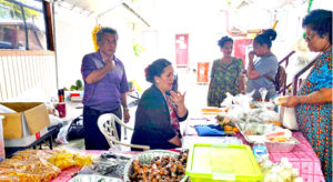 Ebeye residents pick their fresh produce from the MISCo stall in Ebeye.