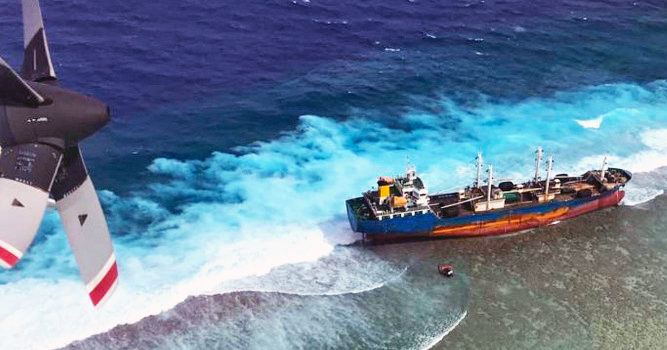 An aerial view of the fish carrier vessel Ou Ya Leng No. 6 that ran aground on the reef at Taka Atoll in the northern Marshall Islands January 3. Fish carrier hits Taka reef