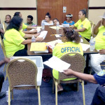 RMI National Election tabulators at the ICC in Majuro count Rairok regular votes Tuesday morning 11-17-15 under the watchful eyes of police and poll watchers. Photo: Giff Johnson