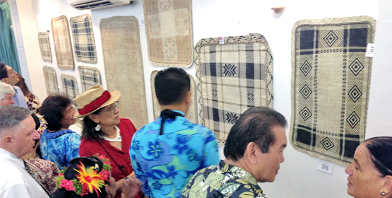 Local residents crowded the Melele Room at Marshall Islands Resort for the ninth Jake-ed exhibition and silent auction. Photo: Giff Johnson. Winning weavers and fashion styles
