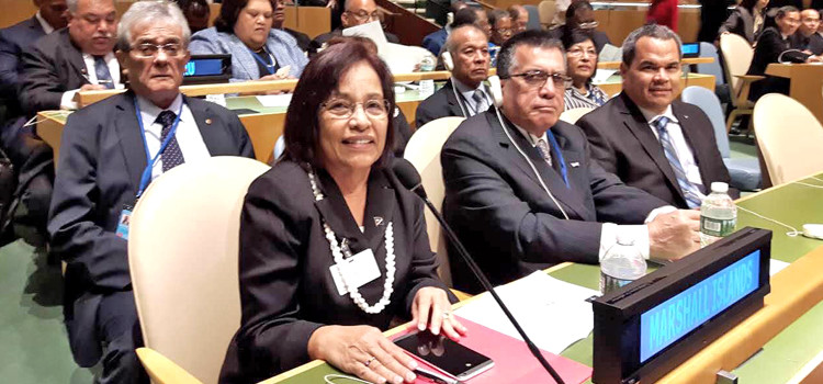 At the United Nations, from left, front: President Hilda Heine, Foreign Minister John Silk, Transportation and Communications Minister Mike Halferty. Back: Climate Ambassador Tony deBrum, Ailuk Senator Maynard Alfred and RMI Honolulu Consul Neijon Edwards. Photo: Chris deBrum. Hilda signs global pact