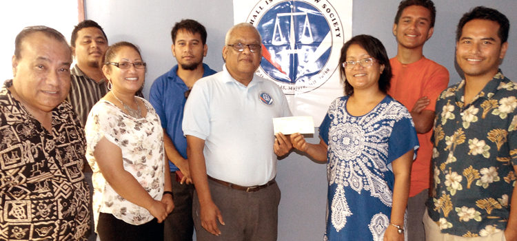 At the donation handover, from left: Jack Jorbon, Meuton Laiden, Claire Loeak, Cutty Wase, Witten Philippo, Rosania Bennett, Marcus Bennett, Anram Chichi Kemem. Photo: Isaac Marty. Lawyers support nuclear team