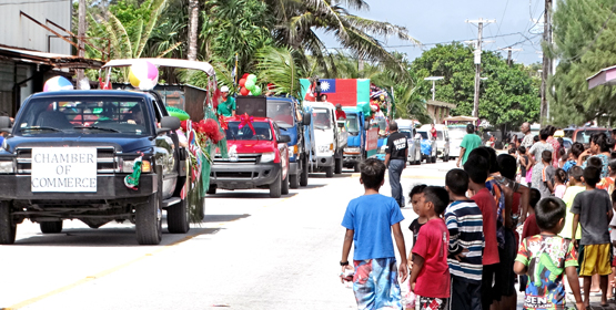 Majuro residents hit the streets in huge numbers to watch the Marshall Islands Chamber of Commerce Christmas Parade Saturday morning. Santa Claus (a.k.a. Alson Kelen) was busy sharing Christmas cheer along with the many parade volunteers who assisted. Dozens of floats took part in the two parades — one from Rita to the airport, the other from the airport to Laura — and literally thousands of people lined Majuro’s main road in anticipation of this annual event the week before Christmas. Photo: Isaac Marty Majuro’s Christmas parade