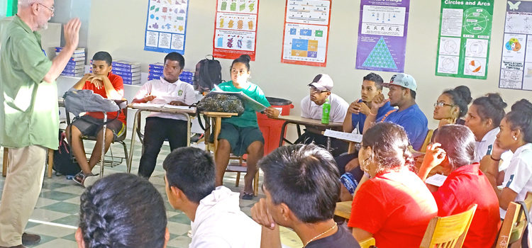 Dartmouth emeritus Professor Andrew Garrod (left) goes over different parts in Oklahoma! with students who are acting in the musical production to be performed at the ICC in Majuro mid-March. This is Garrod’s 13th play produced in the Marshall Islands. Photo: Hilary Hosia. Romance on tap for Majuro
