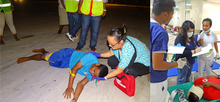 Left, a medic checks an injured man for back and neck injuries. Right, nurses confer over how to tend to a man with facial burns. Photos: Isaac Marty. Airport drill for plane crash