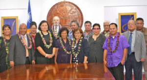 President Hilda Heine, center, joined the swearing in of the RMI National Nuclear Commission. Numerous family members and high officials attended the event that saw Chairperson Rhea Moss-Christian, and Commissioners Bill Graham and Alson Kelen take oaths of office. Photo: Office of the President.