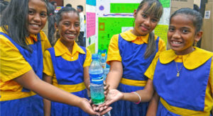 Delap Elementary School fifth graders, from left, Pearlina Jack, Christy Anien, Mina Brian and Joselyn Lautrok during the Education Week science fair at the International Conference Center. Photo: Hilary Hosia