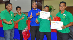 The winning Jaluit debate team, from left: Paul Nemra, Alee Jetton, teacher Johnny Langbon, Helzy Zedkaia, and Matthew Naisher.