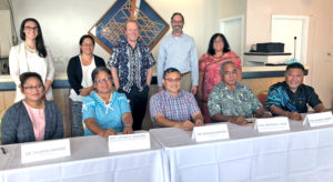 RMI officials got together to sign an agreement following a meeting to sort out details for improving drawdown and use of federal funding.