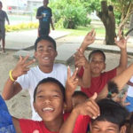 Ben “Batmon” Wakefield surrounded by fans during a visit to Ebeye Island.