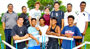 Chris Zablocki (third from left standing) with Majuro and Jaluit runners and track officials in this 2010 file photo. Photo: Giff Johnson.