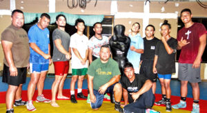 RMI wrestlers going to the Micronesian Games in Yap, from left: Waylon Muller, Kaiser Muller, Isaiah Kramer and Edward Adiniwin have been joined by Bollong Joklur and Kalimen Pabro from Oregon, and Alexander Adiniwin, Richard Adiniwin, Richard Adiniwin, Jr and Andrew Adiniwin all from Hawaii. Photo: Hilary Hosia.
