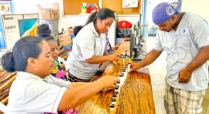 CMI Jaluit, with Adult Basic Education students assistance, conducting Jabor community water quality testing.