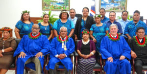 New High Court Judge Witten Philippo, with his wife Florine, center, was sworn in Monday by Chief Justice Carl Ingram (second from left). Ingram took the opportunity to honor out-going Judge Colin Winchester (second from right). TRC Judges Grace Leban (seated left) and Walter Elbon (seated right), District Court Tarry Paul (standing third from right), Clerk of Courts Ingrid Kabua (standing fifth from left) and courthouse staff are also pictured. Photo: Hilary Hosia.