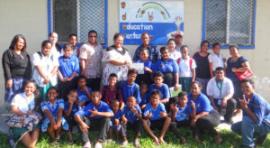 MIEPI board members Hirobo Obeketang, Yolanda Lodge-Ned and Arlington Tibon hand over a $1,000 grant to the Majuro Deaf Education Center for a special project to develop awareness around mental health issues. Photo: Hilary Hosia.