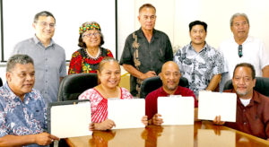 This gathering earlier this month was described as a “monumental event in the history of the RMI public service.” It involved PSC Commissioners along with the Chief Secretary, and four heads of departments signing four-year performance contracts, the first time these heads of ministries have been on performance contracts.&nbsp; Sitting, holding their signed performance contracts, from left: Transportation Secretary Phil Philippo, Finance Secretary May Bing, Works, Infrastructure and Utilities Secretary Catalino Kijiner, and Foreign Secretary Bruce Kijiner. Back, from left: Chief Secretary Ben Graham, PSC Commissioner Justina Langidrik, PSC Chairman Donald Capelle, Deputy Attorney General Johnathen Kawakami and PSC Commissioner Jiba Kabua.