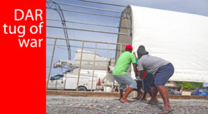 Need tug of war contestants? Search no more. These hard workers played “tug of war” all last week with the resurrection of the new DAR mainstore in Uliga. We think these guys could beat even the toughest tug of war team on Majuro. Photo: Hilary Hosia.