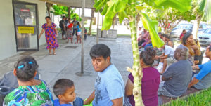 RRE’s Western Union was packed inside and outside with customers the day before Christmas. Photo: Hilary Hosia