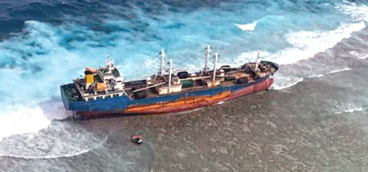 The fish carrier vessel Ou Ya Leng No. 6 hit the reef at Taka Atoll in the northern Marshall Islands January 3 and remains stuck there. Photo: US Coast Guard. Worry for damage from grounded vessel