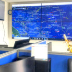 The fisheries surveillance command center at the new MIMRA headquarters features a constantly updated large screen presentation showing the locations of all fishing vessels in the Pacific region. Photo: Giff Johnson.