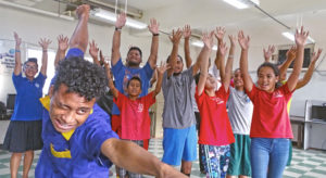 RMI USP student Duke Gaston shows his billiard playing form as he plays the character Harold Hill during a rehearsal of the Music Man in Majuro. The play will be staged for a week next month at the International Conference Center in Majuro. Photo: Hilary Hosia.