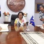 Japan Ambassador Norio Saito, left, and RMI Foreign Minister John Silk, right, sign two grant agreements while President Hilda Heine and Foreign Secretary Bruce Kijiner look on.