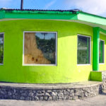 Majuro Computer Services in Majuro showing the main road-facing window, partially covered with plywood, that was broken into in the early morning hours Sunday. Photo: Hilary Hosia.