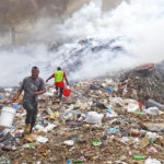 Majuro Atoll Waste Company workers used a bucket brigade to try to contain the fire at the dump March 8. Photo: Hilary Hosia.