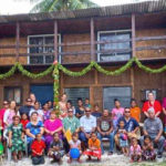 Members of the Laura community join with Growmate Education representatives at the blessing of the new library. Photo: Junko Shindo.