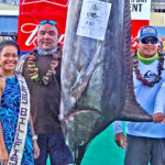 Captain Damien Milne, second from right, and his team fishing on Bakaro caught this 330 pound marlin on day one of the two-day Marshalls Billfish Club annual fishing tournament. The second day he caught the tournament-winning 415 pound marlin. Photo: Hilary Hosia.