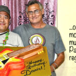 Daniel Kramer and Daniel Rae Costello in Majuro celebrating Kramer’s birthday in January 2016 with an appropriately decorated cake.