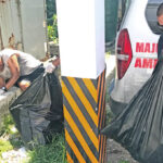 Lina Herkinos from Majuro hospital’s medical records department joined with dozens of Ministry of Health and Human Services staff for a grounds cleanup around the hospital to reduce mosquito breeding sites last Saturday. Photo: Jack Niedenthal.