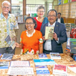 President Hilda Heine and First Gentleman Tommy Kijiner, Jr. joined with RMI Ambassador to Fiji Albon Ishoda (right) and USP officials for a tour of the library that includes a section of publications about the Marshall Islands. USP also has an exhibit dedicated to President Heine.