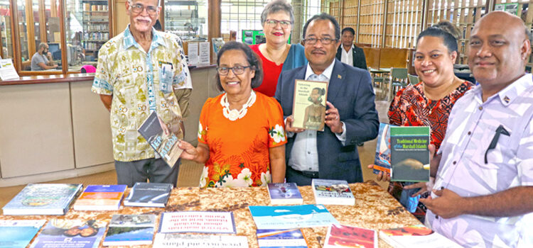 President Hilda Heine and First Gentleman Tommy Kijiner, Jr. joined with RMI Ambassador to Fiji Albon Ishoda (right) and USP officials for a tour of the library that includes a section of publications about the Marshall Islands. USP also has an exhibit dedicated to President Heine. President Heine to be USP chancellor