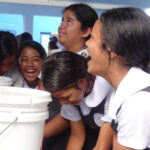 Hygiene has stepped up to new levels in the Marshall Islands, the result of community outreach and action by government agencies and partners. Students at Ebeye’s Queen of Peace Elementary School earlier this week washed hands prior to entering classrooms as part of RMI's Covid-19 prevention practice. Photo: Hilary Hosia.