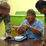 Health Minister Bruce Bilimon, right, with Kwajalein Iroojlaplap and Member of Nitijela Mike Kabua and Kwajalein Army base commander Col. Jeremy Bartel during a meeting on Ebeye May 25. Photo: Hilary Hosia.