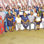 Governmental accounting course graduates and top Finance and CMI officials were on hand June 5 to recognize the 17 who completed the eight-month course. Photo: Eve Burns.