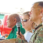 The Ebeye community turned out in force June 1 to hear USAG-KA Commander Colonel Jeremy Bartel (with microphone), US Ambassador Roxanne Cabral and Kwajalein leaders. Pictured with Bartel and Cabral is Irooj Lanny Kabua, right, and Kwajalein Mayor Hirata Kabua, left. Photo: Hilary Hosia.‬