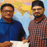 Humanity First Representative and leader of the Marshallese Ahmadiyya Muslim Community Imam Iqbal Sajid (right) and Kwajalein Atoll Local Government Executive Director for Human Resources and Finance Anthony Maika. Photo: Hilary Hosia.