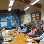 US Army Garrison, Kwajalein Atoll Commander Col. Jeremy Bartel (top left) hosted the Nitijela Health, Education and Social Affairs Committee for a tour of Covid-19 quarantine and isolation facilities on Kwajalein earlier this month. At the table, facing Bartel are, from top: Member of Parliament (MP) Tony Aisaia of Namu, Chairman MP Kalani Kaneko, Vice Speaker Peterson Jibas, MP Joe Bejang of Lib, Foreign Affairs representative Junior Aini, and Education Minister Kitlang Kabua. Photo: Hilary Hosia.
