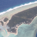 An aerial view of Aur Island, one of two main islands in Aur Atoll, with the runway visible in the foreground.