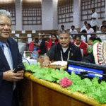 After the Nitijela opening ceremony adjourned for the day August 10, Justice Minister Kessai Note, left, stopped by to chat with Kwajalein Iroojlaplap and Member of Parliament Mike Kabua, right, and Namu MP Tony Aisaia. Photo: Eve Burns.