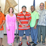 Immediately after his release from 21-day quarantine following a final negative Covid-19 test, USAG-KA employee Joe Rubon (center) met with, from left: Col. Jeremy Bartel, Kwajalein Member of Parliament (MP) David Paul, US Ambassador Roxanne Cabral, Rubon, Kwajalein Mayor Hirata Kabua, RMI Liaison Lanny Kabua and Rachel Hickman, Reagan Test Site Deputy Range Director. Photo: Hilary Hosia.