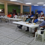 Concern about a resurgence of dengue fever in the Marshall Islands promoted the Ministry of Health and Human Services to reach out to the Ministry of Education to encourage prevention activities in the schools. Deputy Secretary Mailynn Konelios-Lang, left, spoke about prevention activities to public school principals on September 18 at PSS headquarters. Photo: Eve Burns.