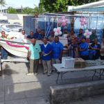 A large number of Ministry of Health and Human Services staff joined in the blessing ceremony for the Miss Joanne, the hospital’s new boat donated by Joanne Dufour and Dick Nelson of Washington state. Photo: Eve Burns.