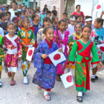 Students in Japanese kimonos, Samoan Sarongs (dress lavalavas), Hawaiian leis and Pohnpeian skirts jammed the street on Ebeye Tuesday morning — initiating Ebeye Seventh Day Adventist School's International Day festivities.