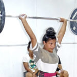 RMI Weightlifting team member Niiti Atantaake is among a group of athletes in Laura who are working out in anticipation of the Micronesian Games in Majuro in 2022. Photo: Eve Burns.