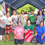 A happy group of super sewers outside Kimberly Matthew’s Ene Rose Shop in Enedrik where her designs are sold and those interested can inquire about learning how to sew. Photo: Eve Burns.